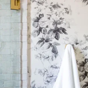 Elegant floral wallpaper with soft gray and white tones for stylish interior decor.