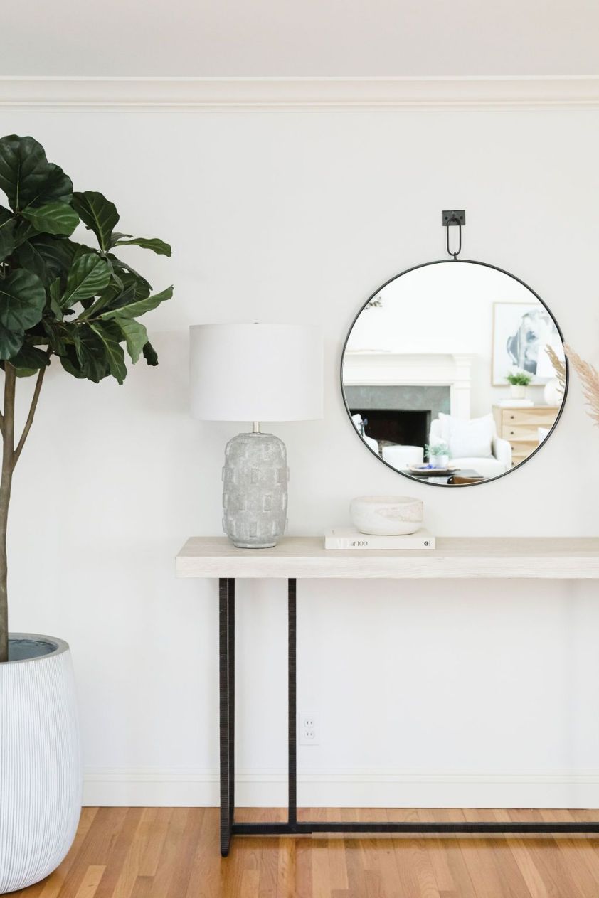 Stylish round wall mirror ideal for contemporary interior design. Perfect for enhancing space and li.