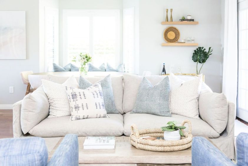 Elegant living room with stylish pillows and cozy decor for interior design inspiration.