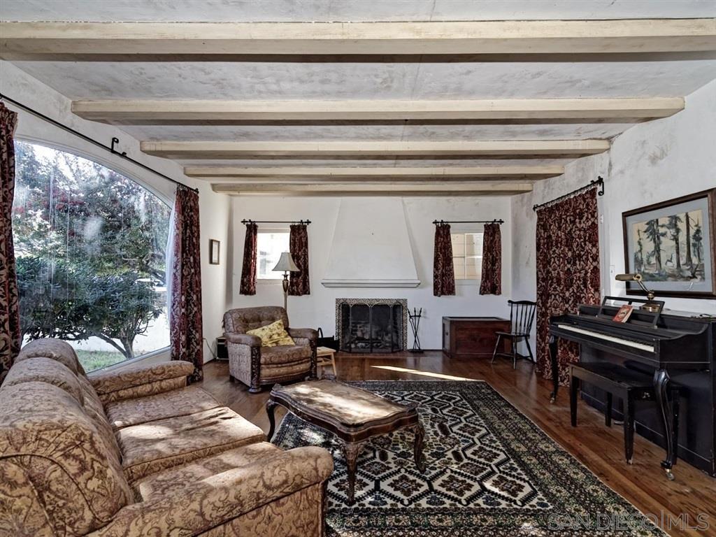 Interior view of a living room showcasing elegant decor and classic furnishings.