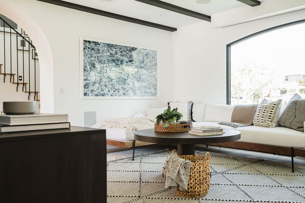 Modern living room interior with stylish furniture and decor.