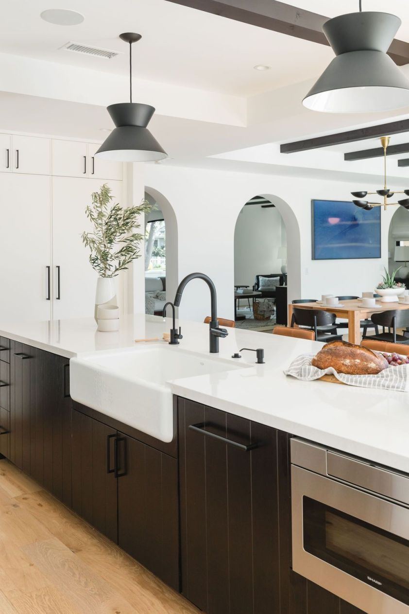 Modern kitchen design with sleek cabinetry and island.