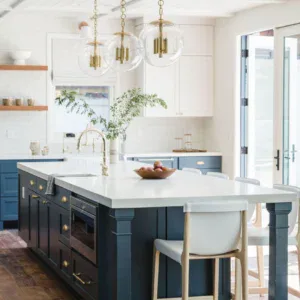 Ceiling design featuring stylish pendant lights in a contemporary kitchen setting.