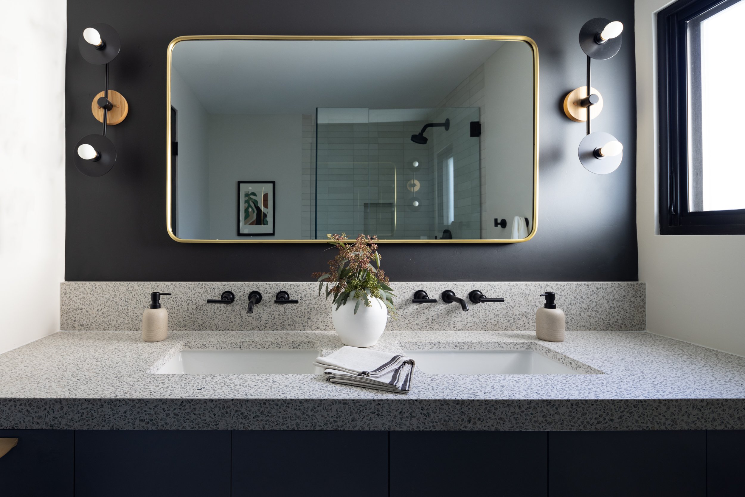 Elegant bathroom interior featuring contemporary design and stylish lighting.