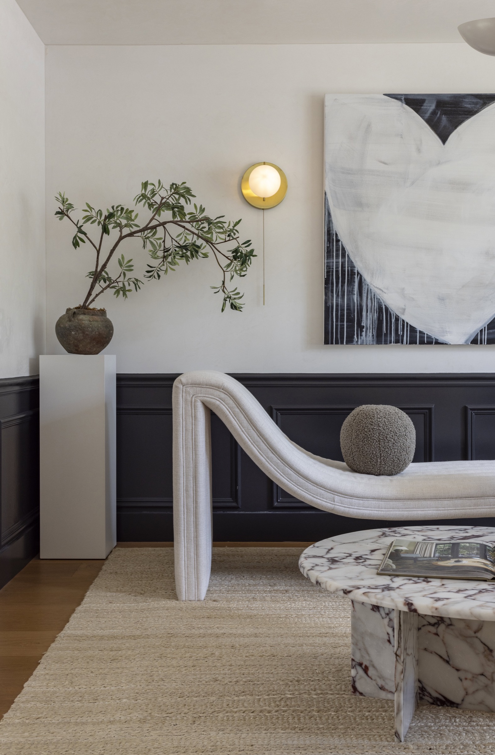 Elegant living room featuring contemporary decor and a stylish marble coffee table.