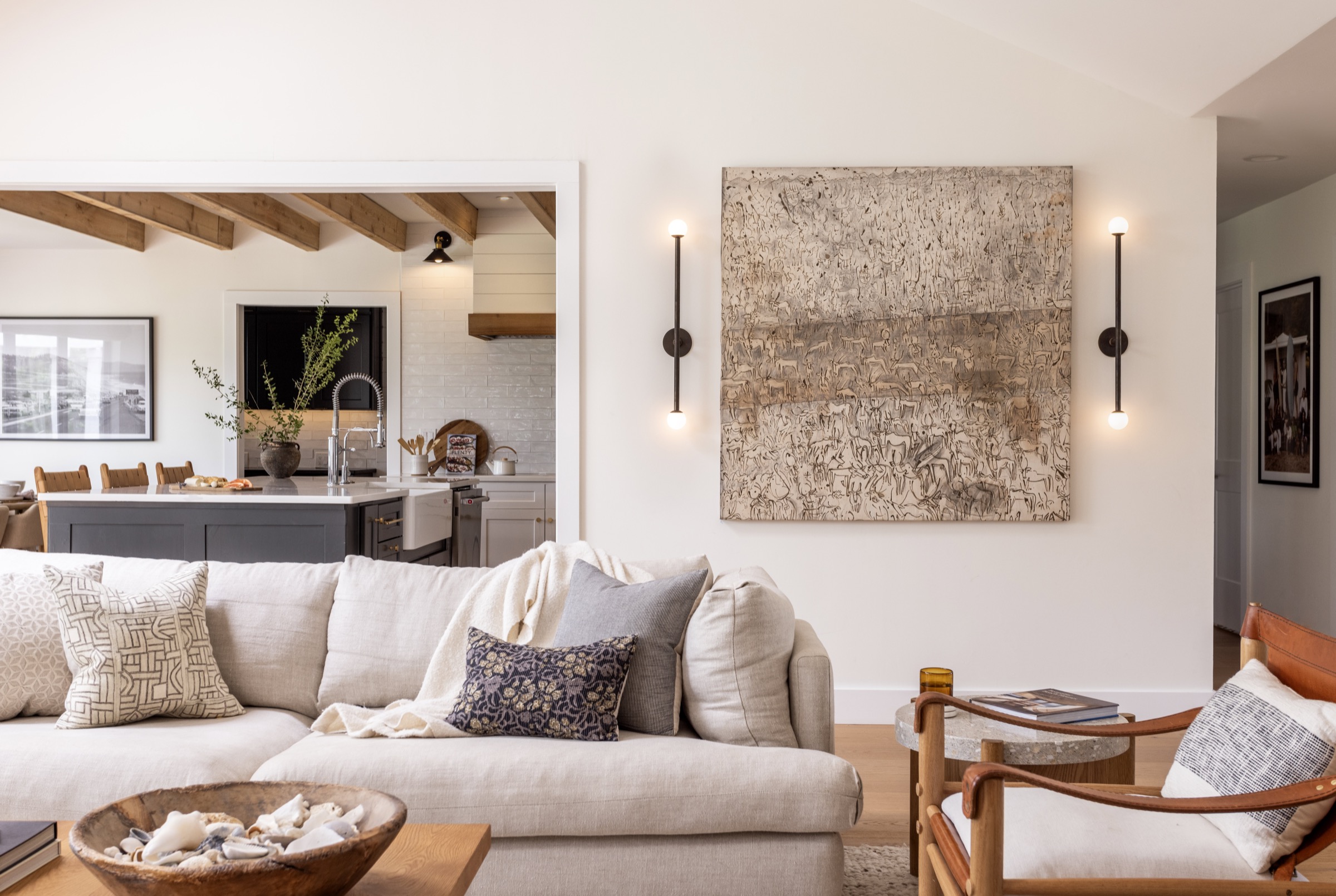 Stylish coastal living room with neutral tones and contemporary decor.