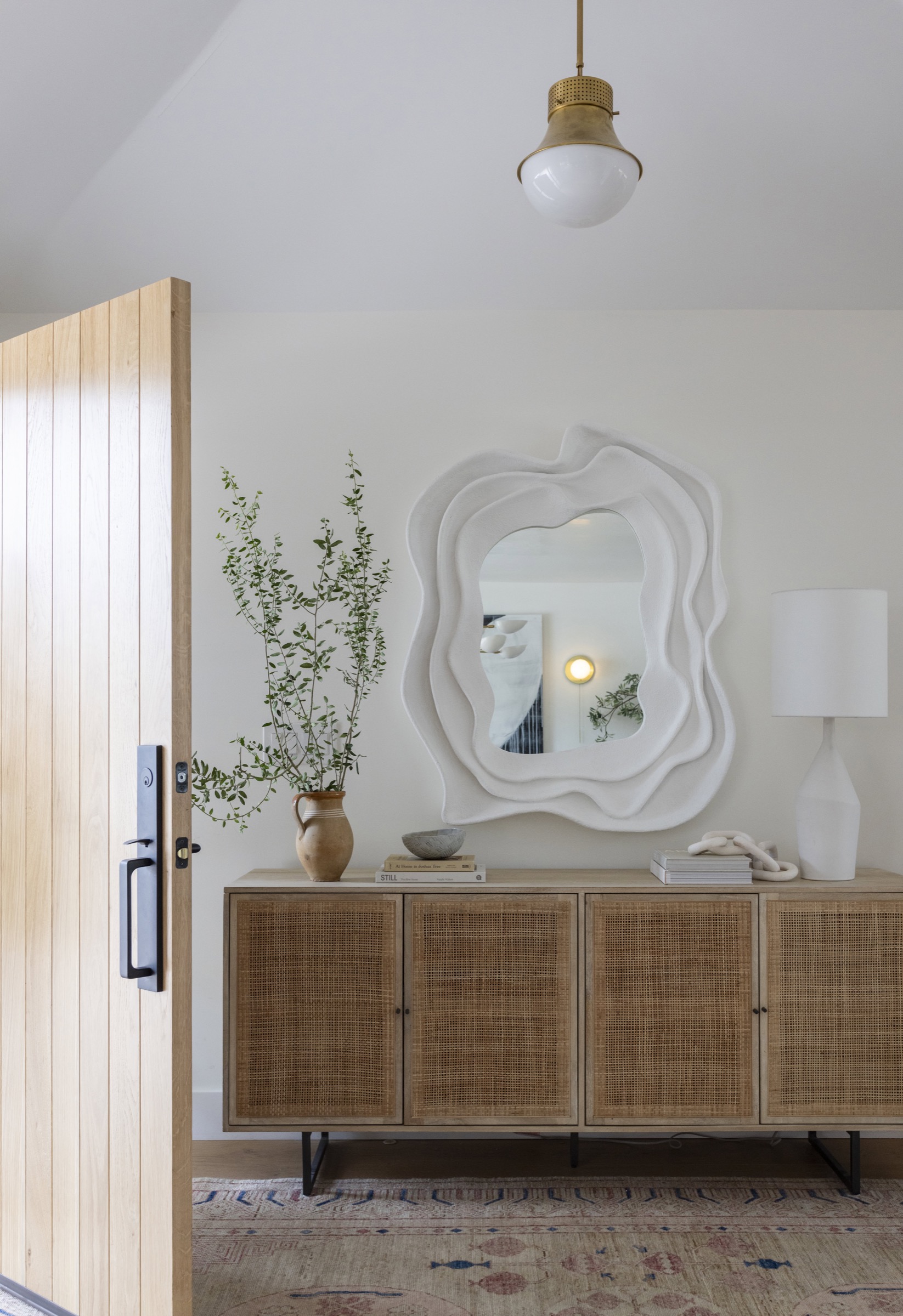 Elegant coastal-inspired interior with natural wood accents and soft lighting.