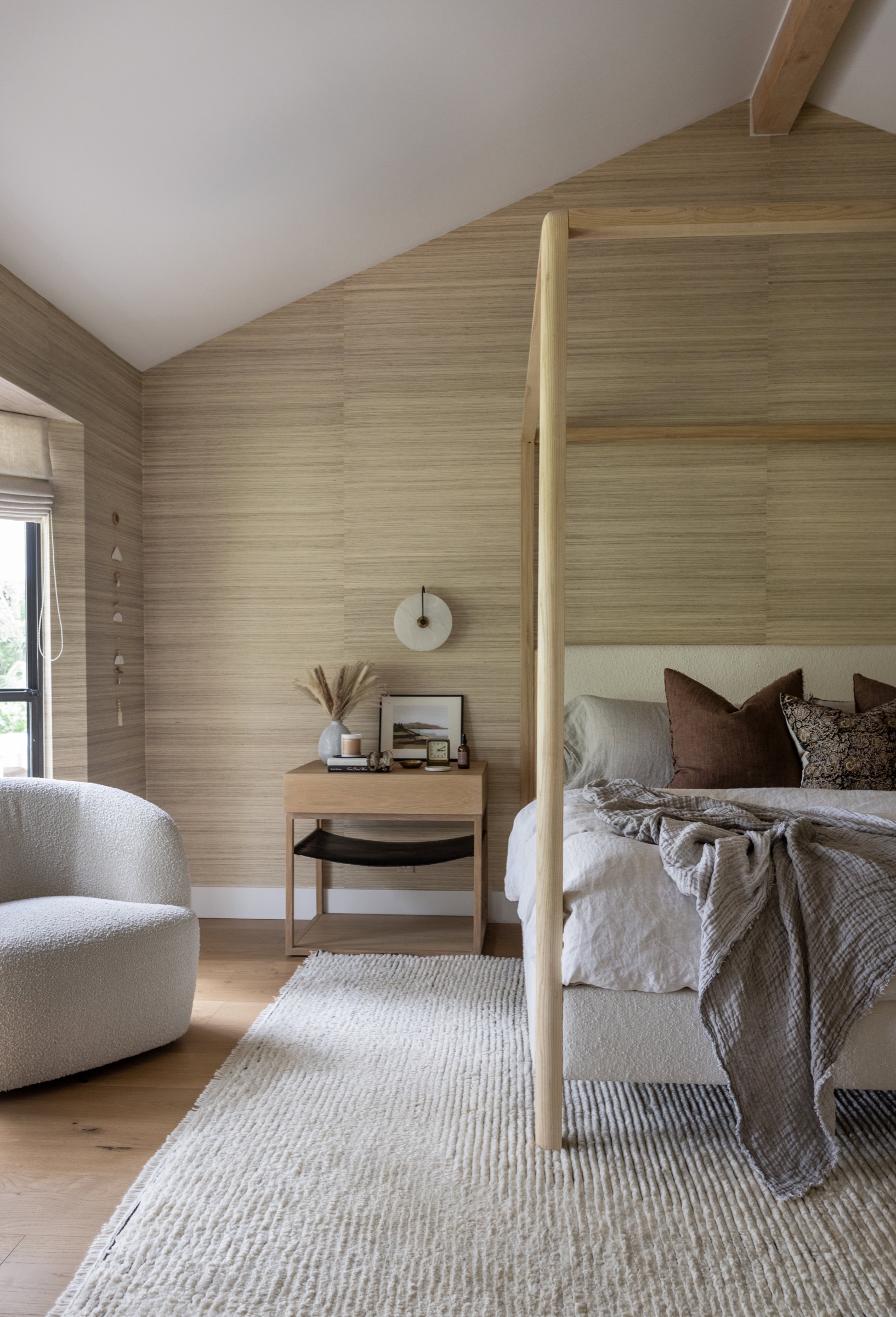 Cozy bedroom with wooden walls and modern decor in Ponte Vedra Beach.