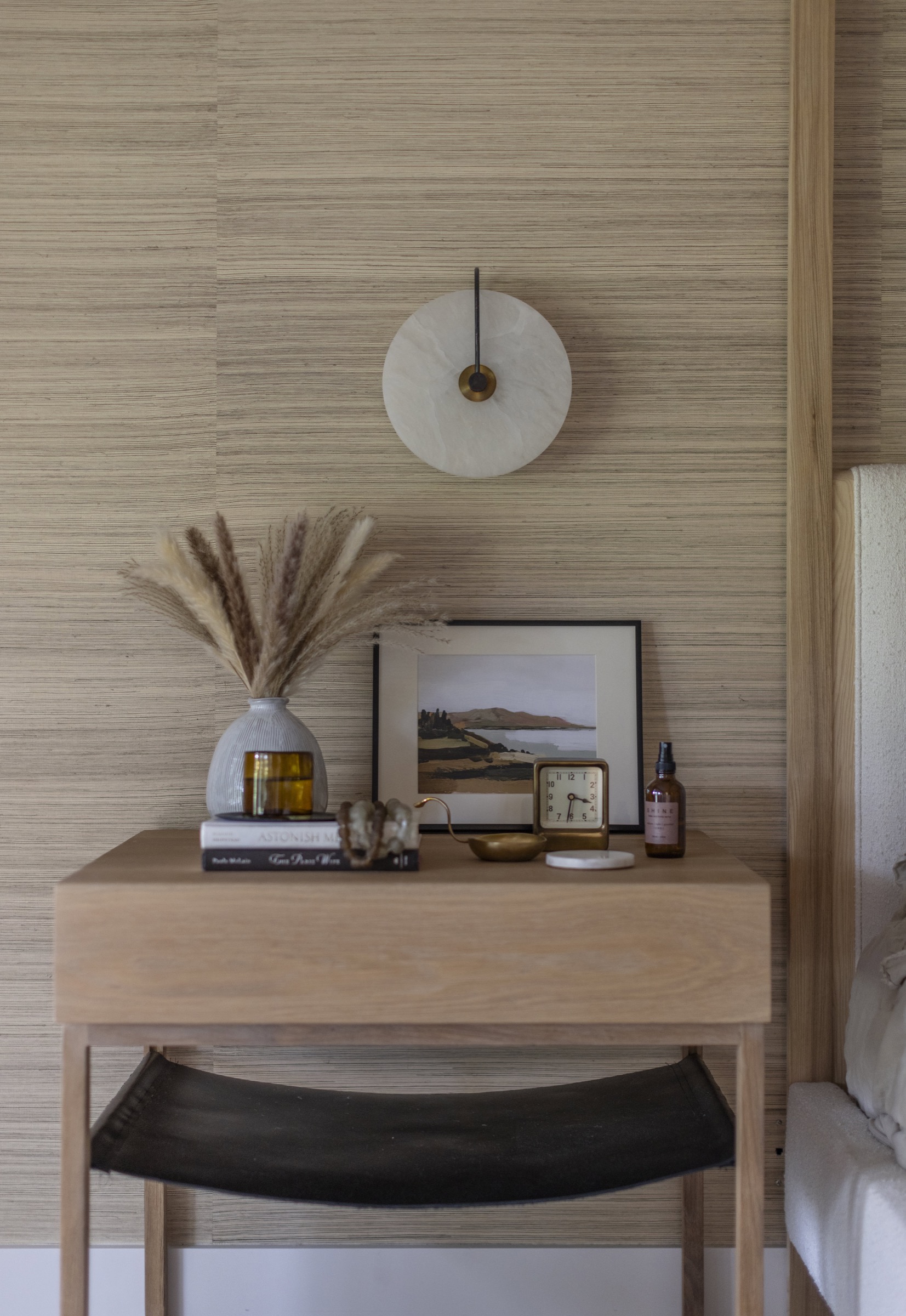 Coastal-inspired interior decor with minimalist wooden furniture and decorative accents.
