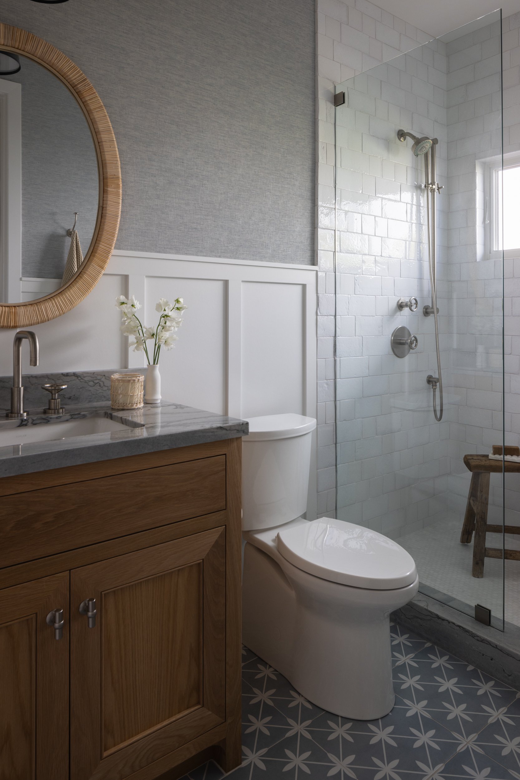 Neptune bathroom with walk-in shower and stylish decor.