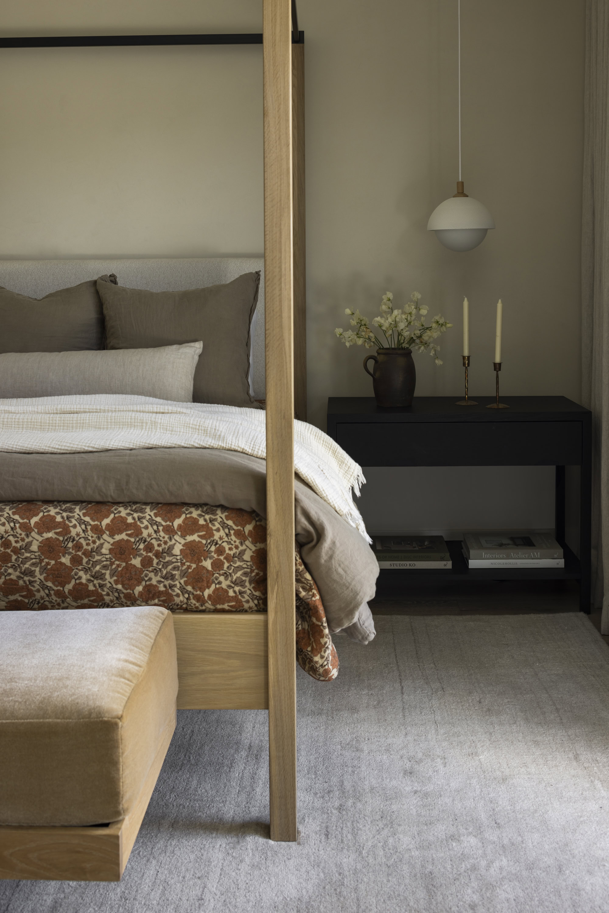 Stylish bedroom with neutral tones and contemporary decor elements.