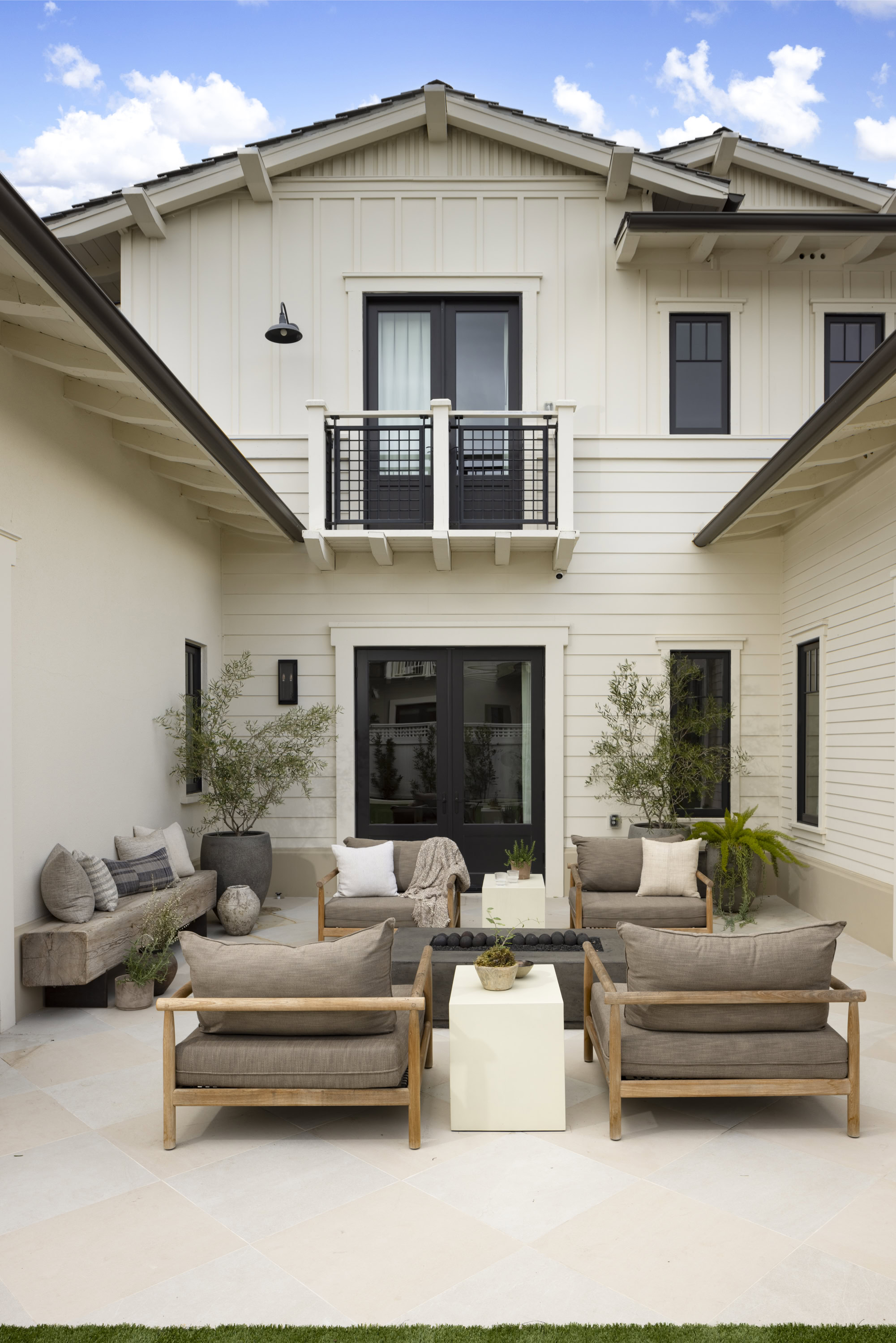Outdoor patio with stylish seating and greenery in Rolling Hills Estates.