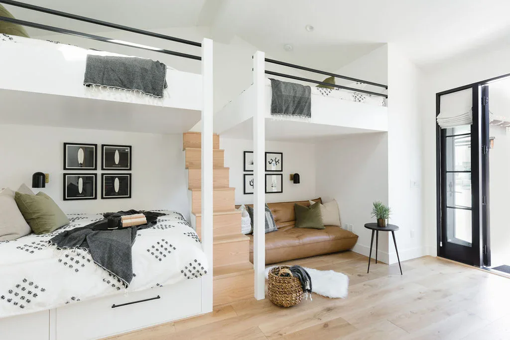 Bright, airy interior featuring a cozy sleeping nook and contemporary design elements.